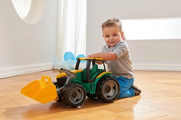 Tractor cu cupă verde și galbenă