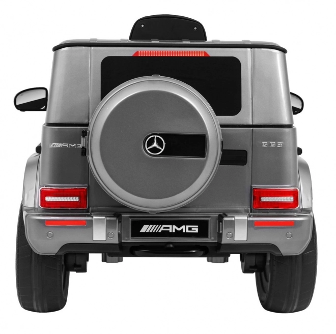 Mercedes AMG G63 pentru copii Vopsea argintie + telecomandă + MP3 LED + start lent + EVA + centuri