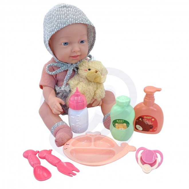 Bebe cu accesorii de hrănire de la Woopie Royal