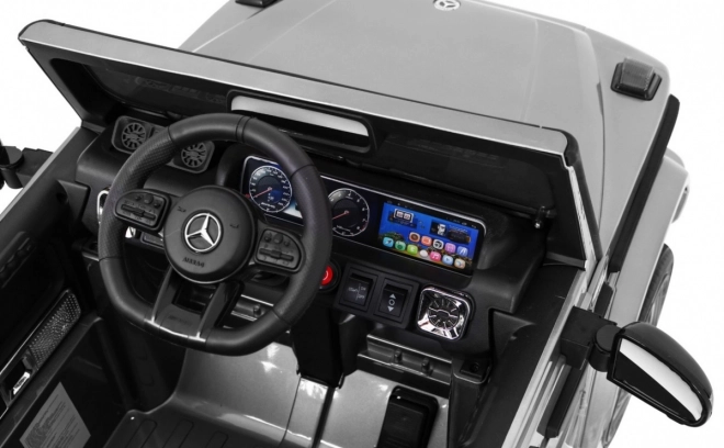 Mercedes AMG G63 pentru copii Vopsea argintie + telecomandă + MP3 LED + start lent + EVA + centuri