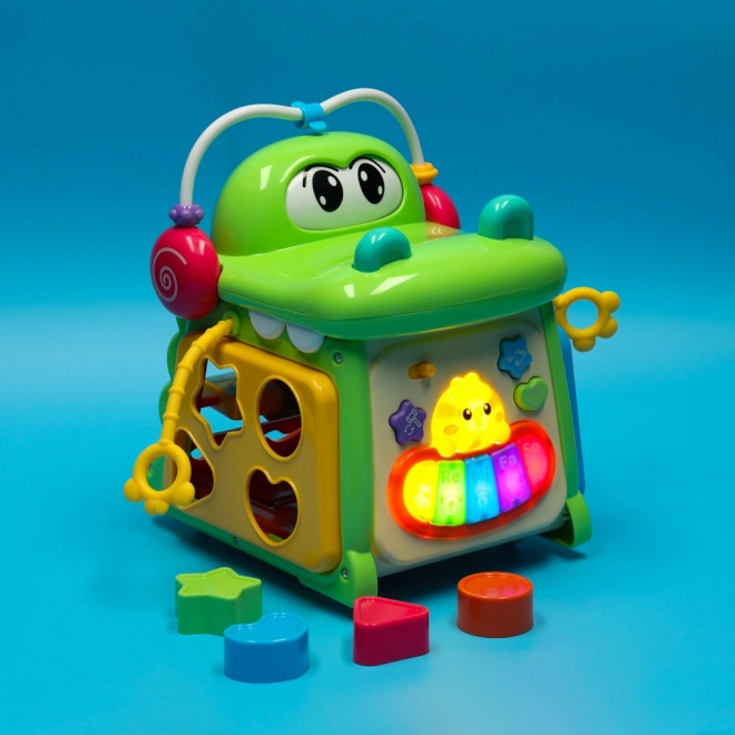 Cub educativ crocodil 4‑în‑1 cu sortator și pian