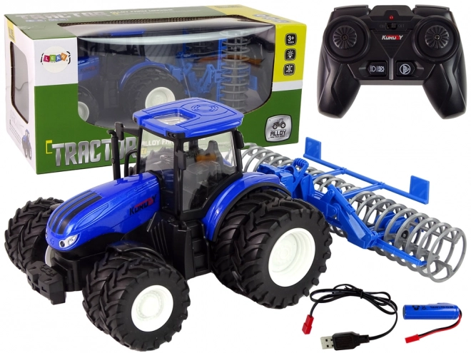 Tractor albastru cu telecomandă și disc metalic 1:24