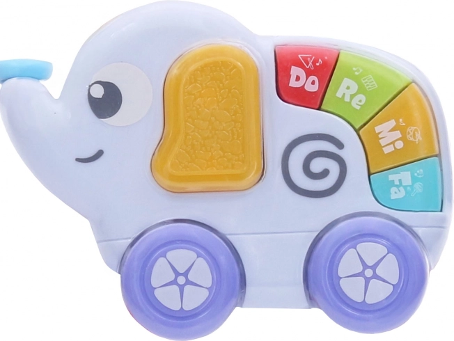Elefant interactiv cu pian, cu efecte luminoase și sonore
