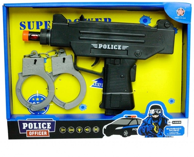 Set polițist cu pistol și cătușe