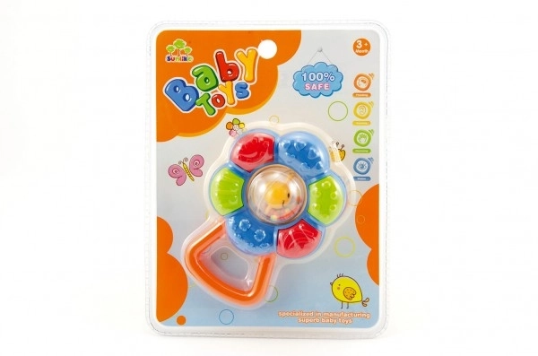 Zornă floricică plastic 12cm 2 culori pe cartonaș 3m+