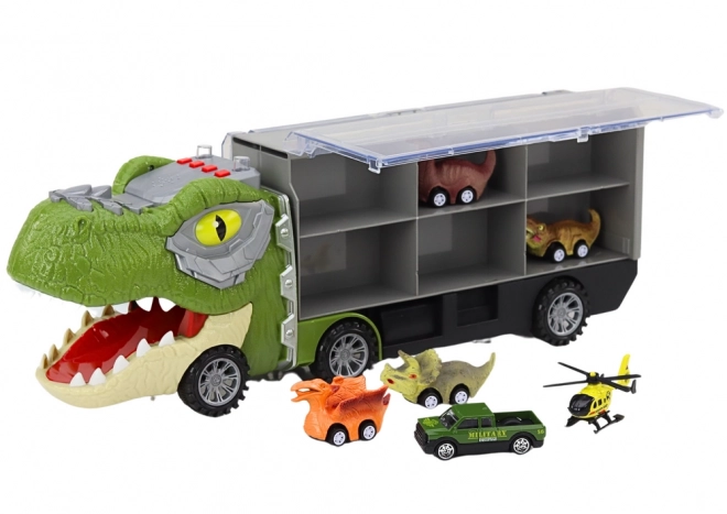 Camion transportator de dinozauri cu mașini