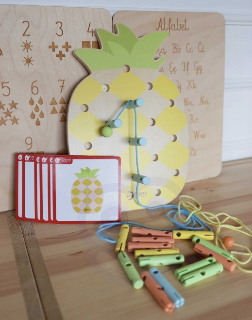 Jucărie educativă din lemn Ananas cu pioneze Classic World