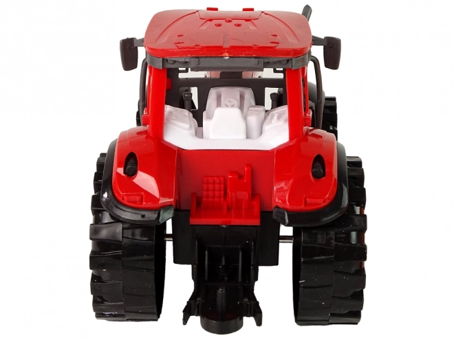 Tractor cu cultivator cu motor roșu prin frecare