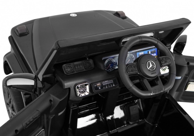 Mercedes AMG G63 pentru copii Lak negru + telecomandă + MP3 LED + pornire lentă + EVA + centuri