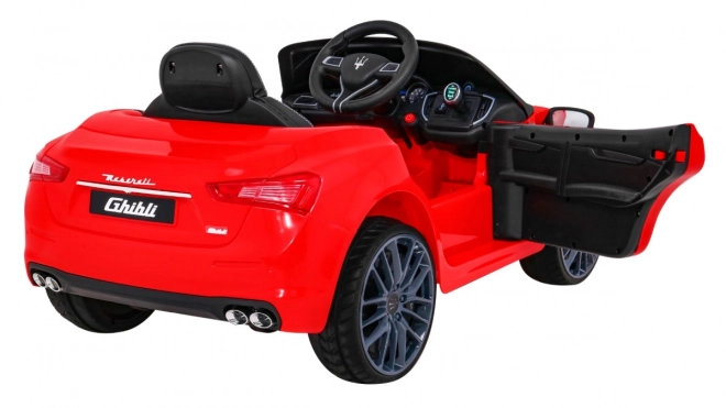 Maserati Ghibli cu baterie pentru copii roșu + telecomandă + pornire lentă + EVA + MP3 USB + LED