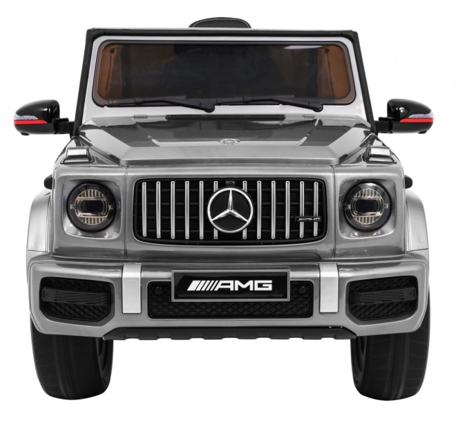 Mercedes AMG G63 pentru copii Vopsea argintie + telecomandă + MP3 LED + start lent + EVA + centuri