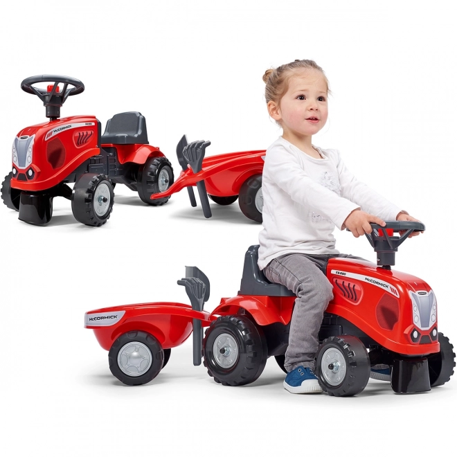 Tractorul Baby Mac Cormick roșu cu remorcă