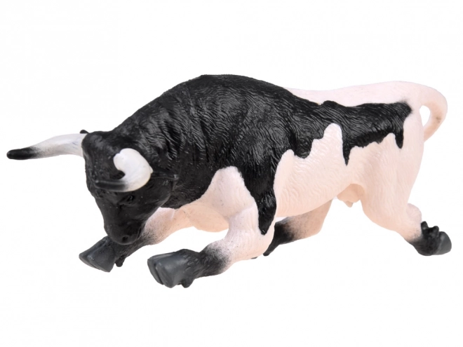 Figurină taur alb-negru gata de atac