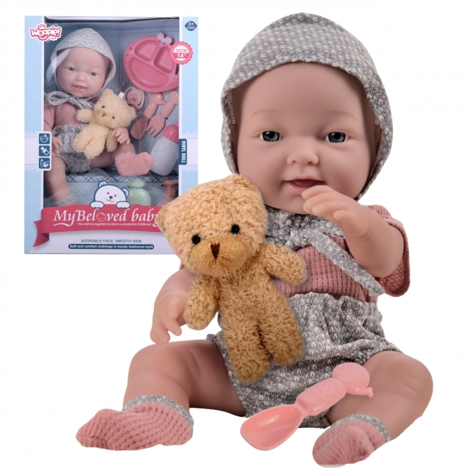 Bebe cu accesorii de hrănire de la Woopie Royal