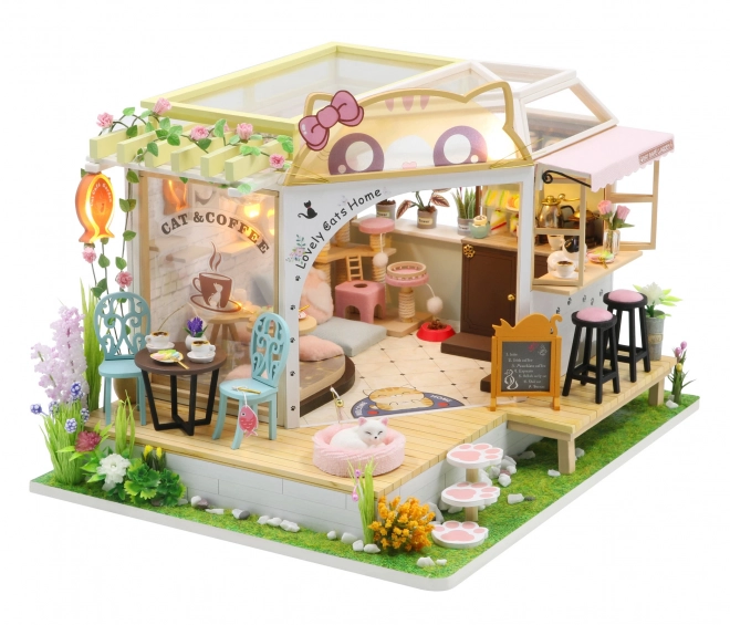 Miniatura căsuței cafenea pisicilor cu grădină
