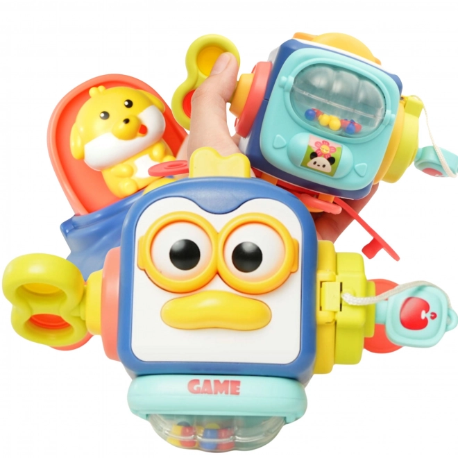 Pingwin WOOPIE educațional Montessori 6-in-1 cu bile senzoriale