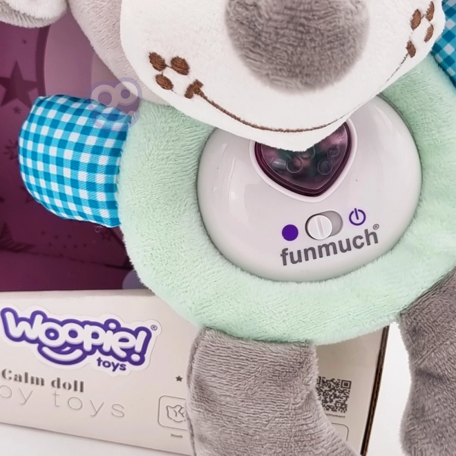 Căţeluş interactiv pluș cu lumină și sunet Woopie Baby