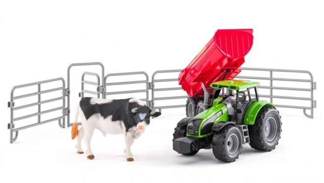Tractor cu remorcă și taur