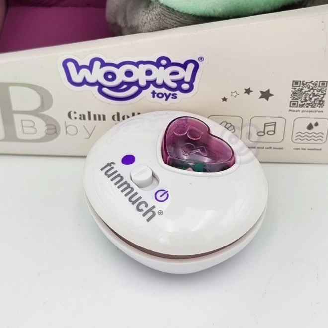 Căţeluş interactiv pluș cu lumină și sunet Woopie Baby