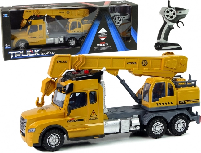 Camion galben telecomandat cu macara și sunete