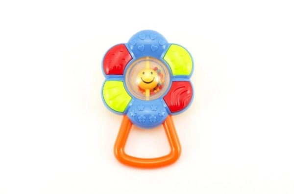 Zornă floricică plastic 12cm 2 culori pe cartonaș 3m+