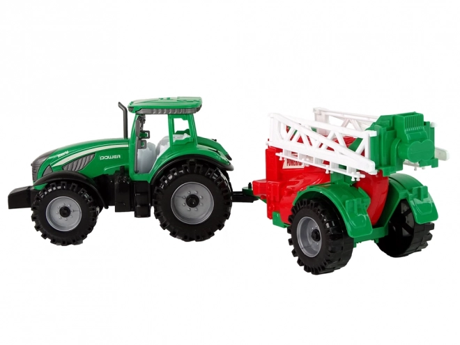 Tractor verde cu pulverizator roșu-verde cu tracțiune prin frecare