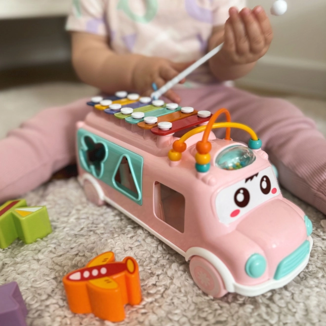 Woopie auto muzical roz cu elemente de sortare și țambale