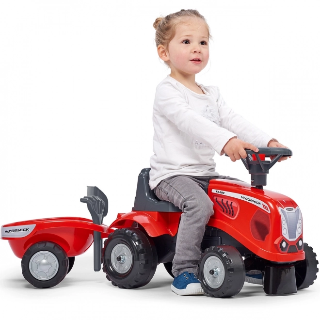 Tractorul Baby Mac Cormick roșu cu remorcă