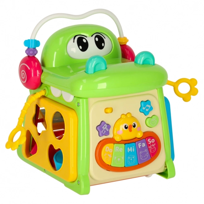 Cub educativ crocodil 4‑în‑1 cu sortator și pian