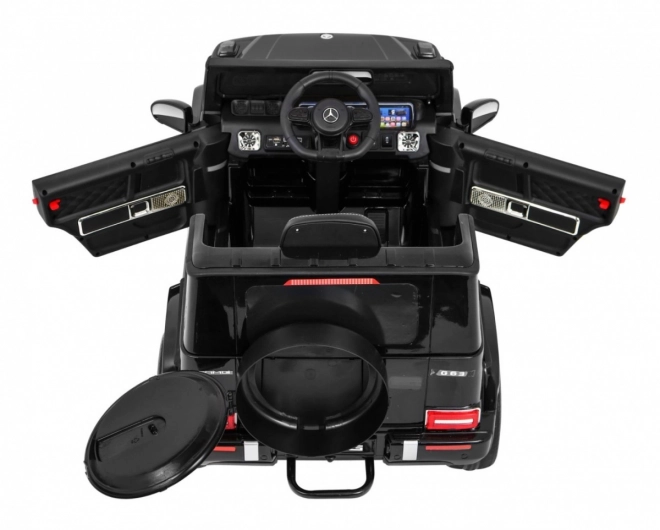 Mercedes AMG G63 pentru copii Lak negru + telecomandă + MP3 LED + pornire lentă + EVA + centuri