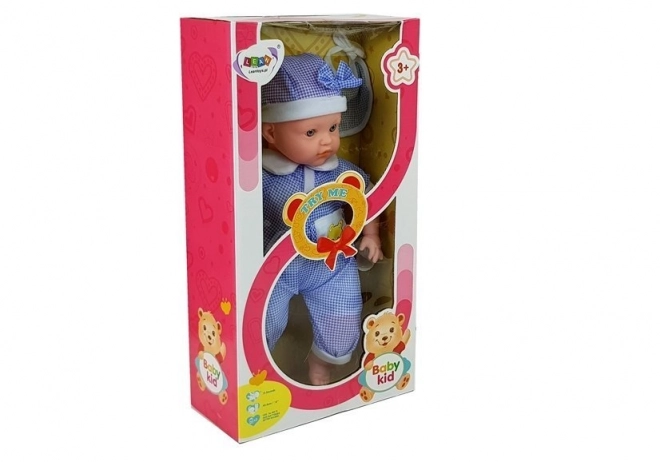 Păpușă bebeluș îmbrăcată în albastru 45 cm
