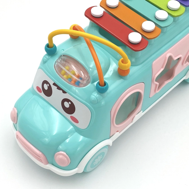 Woopie auto muzical roz cu elemente de sortare și țambale