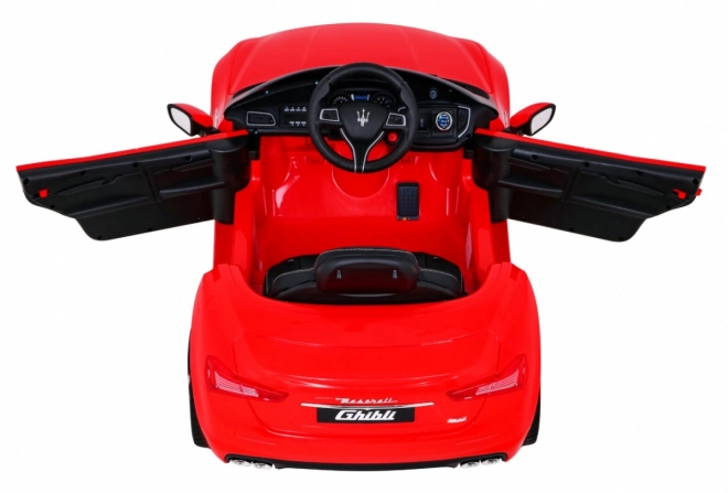 Maserati Ghibli cu baterie pentru copii roșu + telecomandă + pornire lentă + EVA + MP3 USB + LED