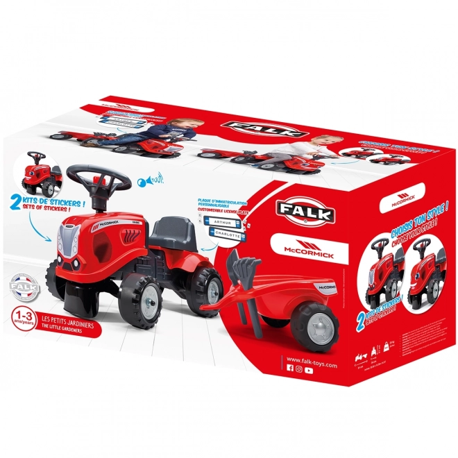 Tractorul Baby Mac Cormick roșu cu remorcă