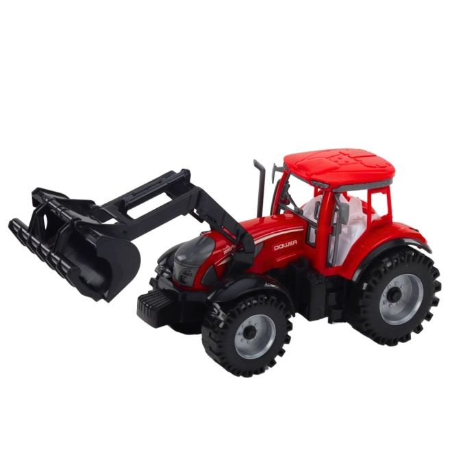 Tractor roșu cu încărcător și presă de balotat