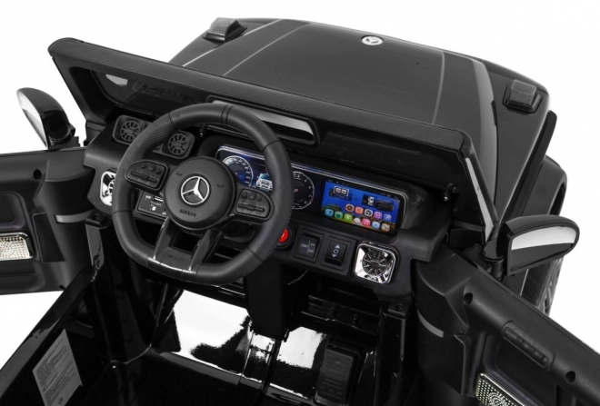 Mercedes AMG G63 pentru copii Lak negru + telecomandă + MP3 LED + pornire lentă + EVA + centuri