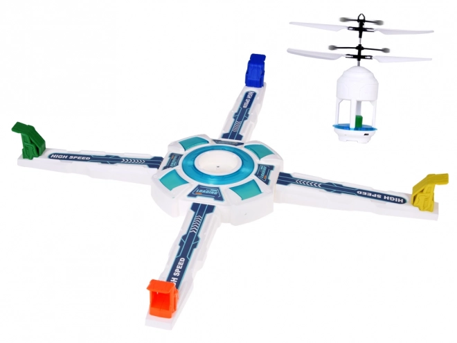 Dron z joc de îndemânare cu stație aeriană