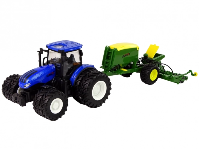 Tractor albastru cu balotieră teleghidat la scară 1:24