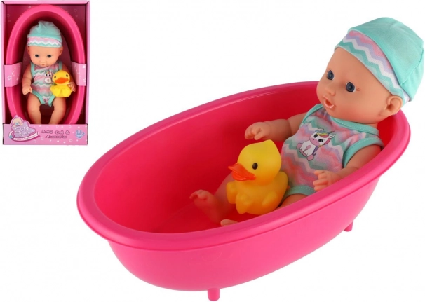 Păpușă bebeluș pentru cădiță cu rățușcă 22 cm