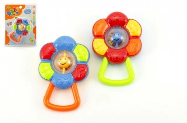Zornă floricică plastic 12cm 2 culori pe cartonaș 3m+