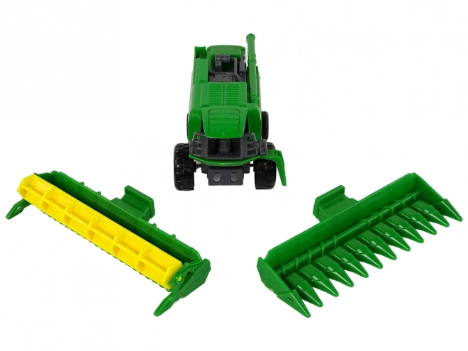Combina agricolă cu secerătoare verde și galbenă