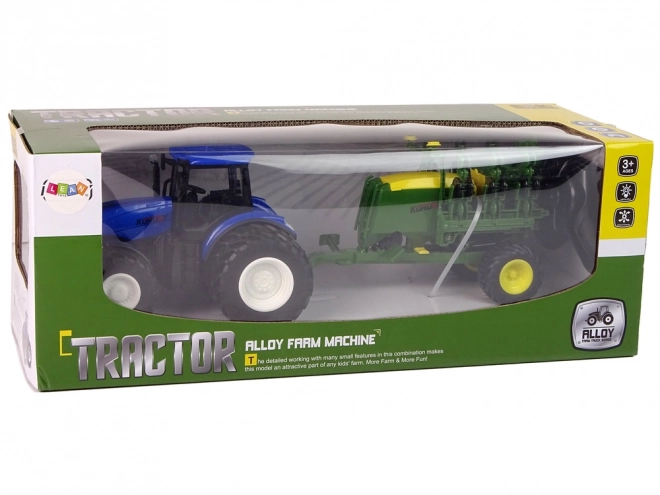 Tractor albastru cu balotieră teleghidat la scară 1:24