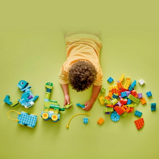Set de construcție LEGO DUPLO 3 în 1: Dinozauri pe Roți