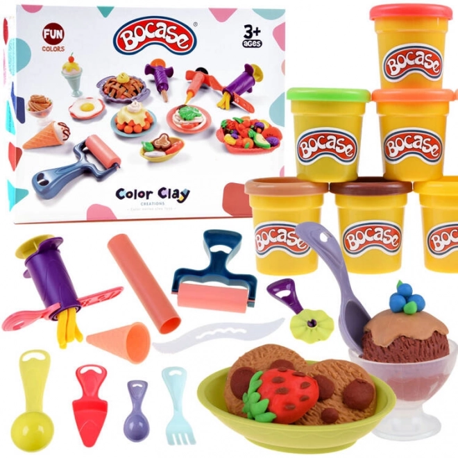 Set delicios de cofetar junior - plastilină și forme pentru prăjituri