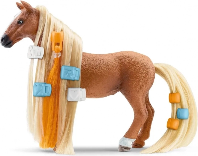 Coamă lungă, care poate fi pieptănată, și accesorii de styling