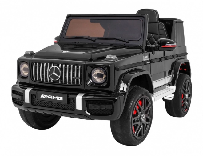 Mercedes AMG G63 pentru copii Lak negru + telecomandă + MP3 LED + pornire lentă + EVA + centuri