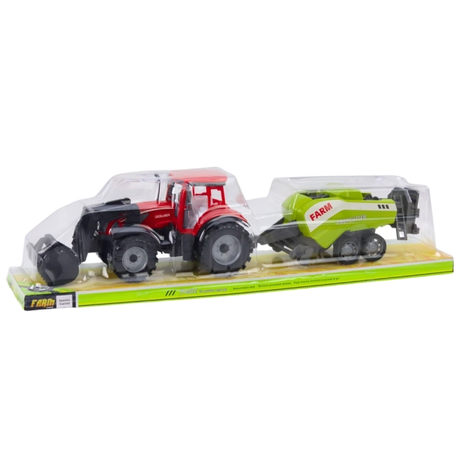 Tractor roșu cu încărcător și presă de balotat