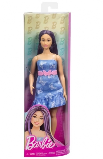 Barbie model în rochie albastră cu fluturi