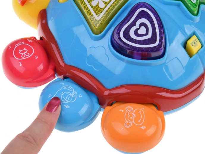 Îi învață culorile și animalele