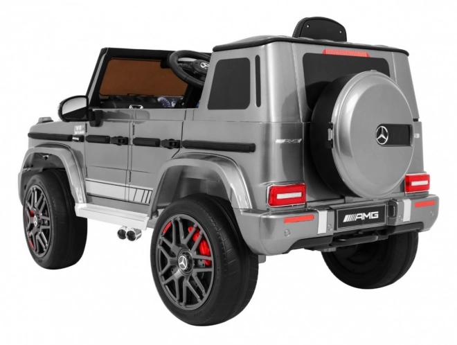 Mercedes AMG G63 pentru copii Vopsea argintie + telecomandă + MP3 LED + start lent + EVA + centuri